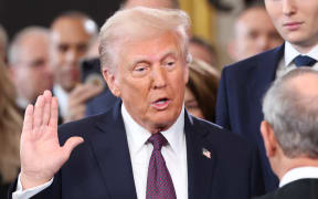 US President-elect Donald Trump takes the oath of office from US Supreme Court Chief Justice John Roberts.