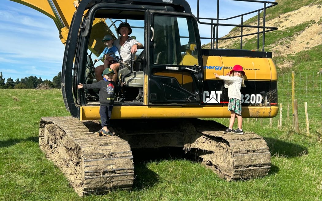 The Gaddum family at work repairing tracks damaged during Cyclone Gabrielle.