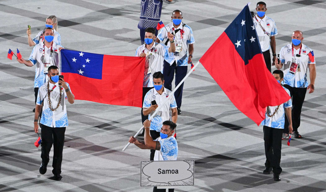 Samoa's flag bearer Alex Rose leads the delegation during the opening ceremony of the Tokyo 2020 Olympic Games.