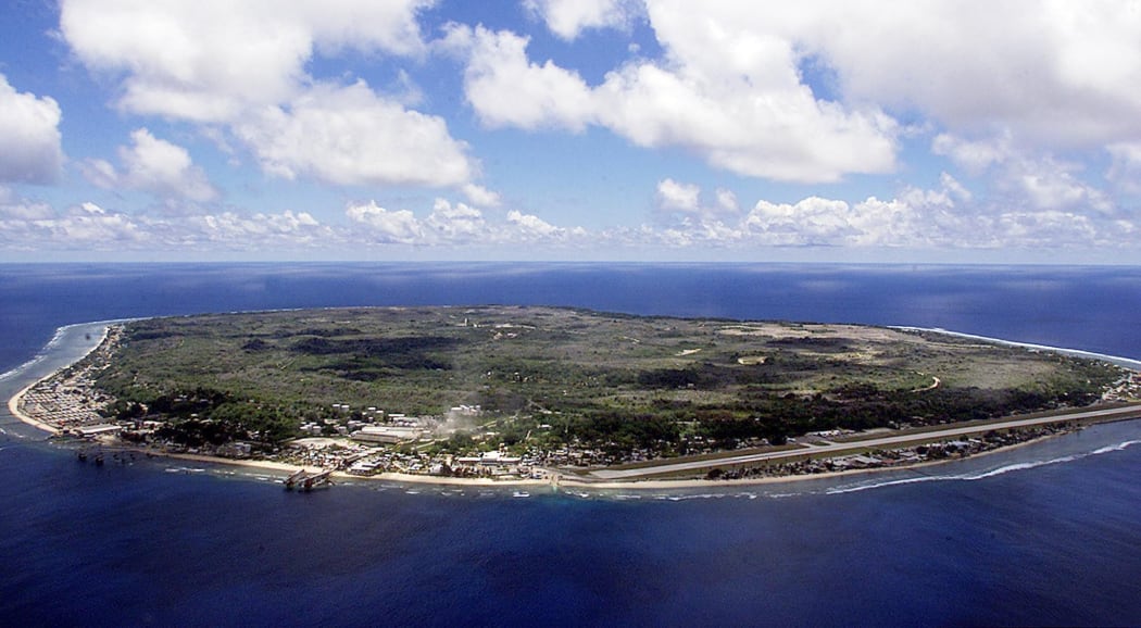 The barren and bankrupt island state of the Republic of Nauru awaits the arrival of refugees, 11 September 2001. Just 25 square kilometres, Nauru has been devastated by phosphate mining which once made the Micronesians the second wealthiest people per capita on earth. AFP PHOTO/Torsten BLACKWOOD