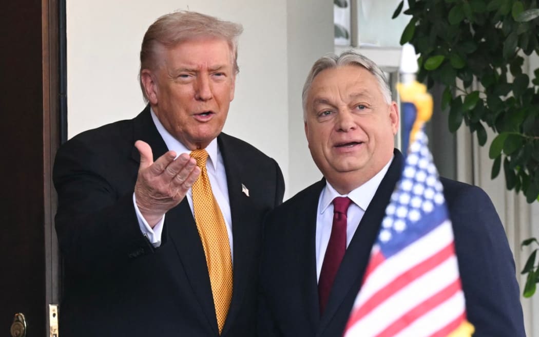 US President Donald Trump greets Hungarian Prime Minister Viktor Orban outside the West Wing of the White House in Washington, DC on November 7, 2025.