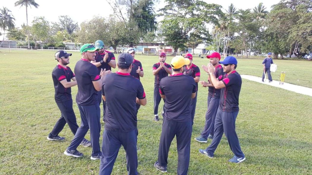 Refugees stuck on PNG's Manus Island play in a cricket tournament.
