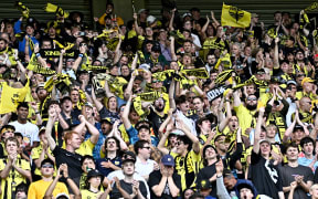 Phoenix fans celebrate scoring a goal.