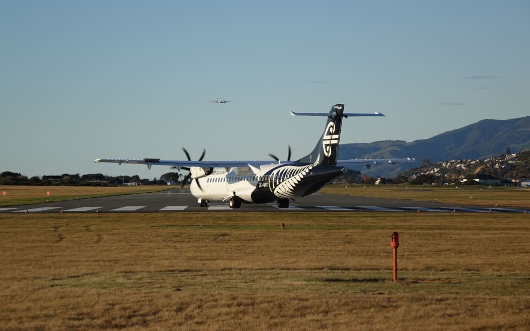 An Air New Zealand turboprop plane prepares for takeoff from Nelson Airport.