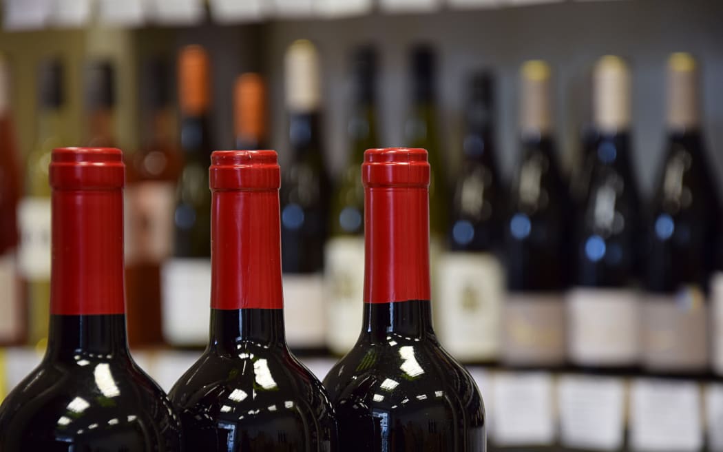 Wine bottles in wine store and ready for home delivery