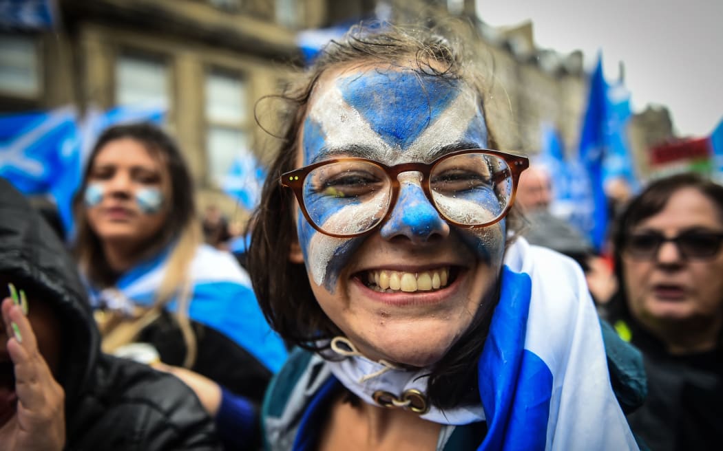 Demonstrators attend a pro-independence march from Holyrood to the Meadows in Edinburgh, Scotland on October 5, 2019.