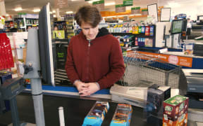 Conor Stokes checks out his Hot Wheels cars and Tick Tac Minis.