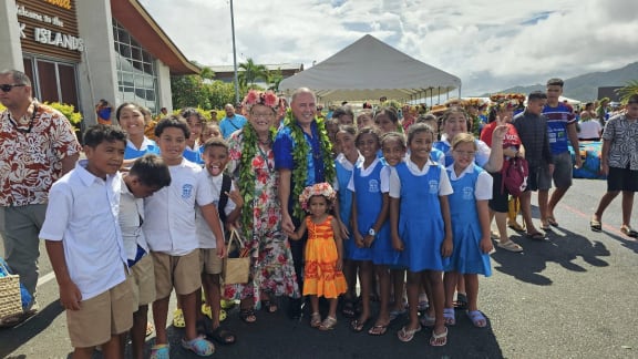 Prime Minister Mark Brown poses with students from Apii St Josephs who were involved in the festivities.