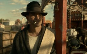 Bradley Cooper in the film NIGHTMARE ALLEY. Photo by Kerry Hayes. Â© 2021 20th Century Studios All Rights Reserved