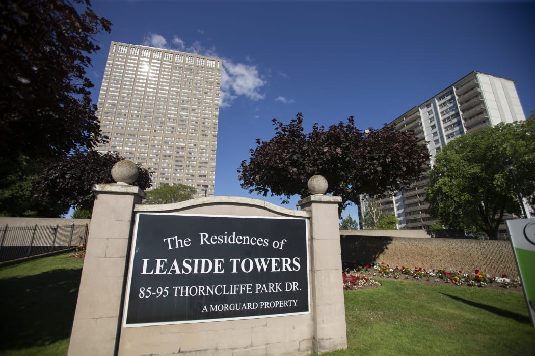 The sun reflects off of the Leaside Towers in Toronto, Ontario, July 6, 2018, where accused serial killer Bruce McArthur lived at the time of his arrest. Canadian police announced the discovery of human remains buried at a Toronto property where McArthur worked as a landscape gardener.