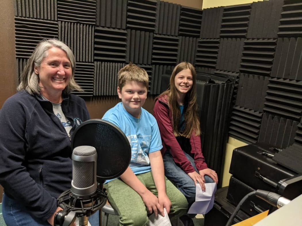 Tami Rowe, Isaac and Natalie from the Skagit Adventist Academy which raised more than $3,000 to help Tonga.