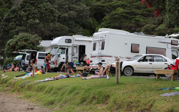 Freedom campers at Kowharewa Bay, on the Tutukaka coast.