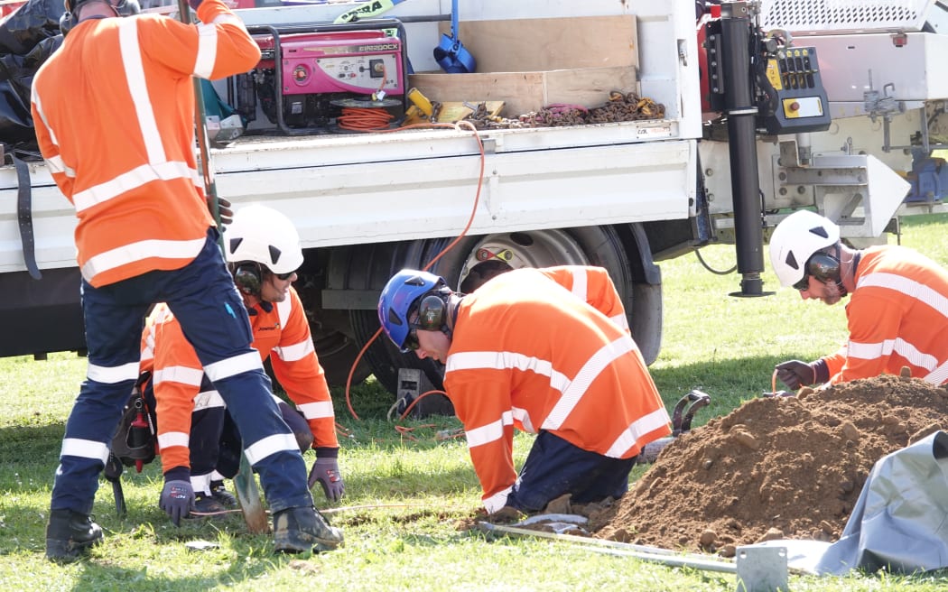 Annual Connection competition's line mechanic teams were digging Earth banks for equipment.