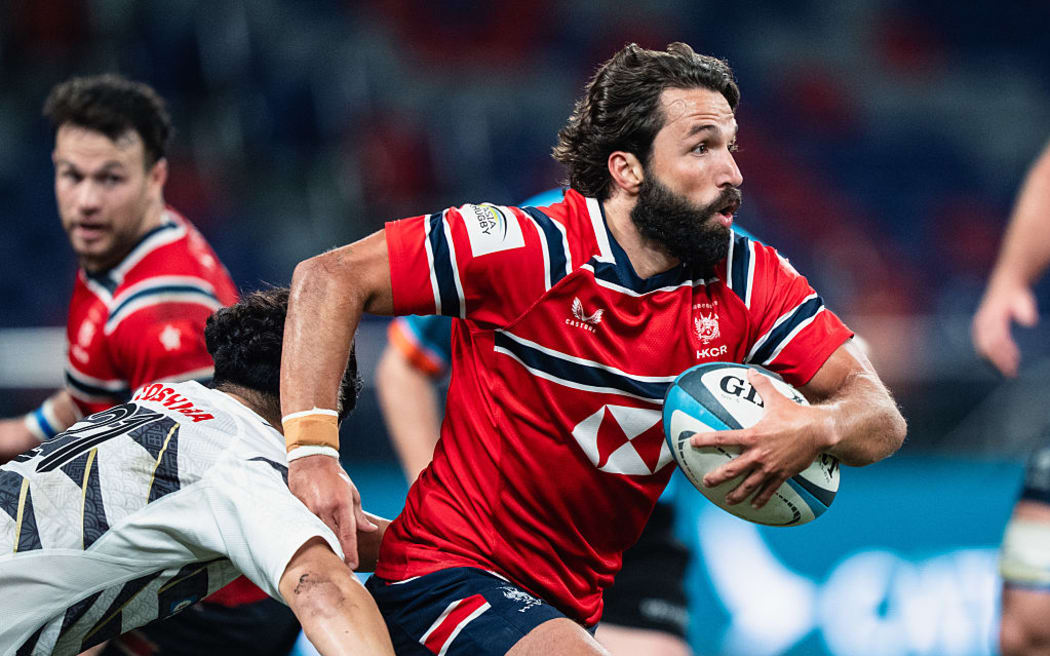 Guy Spanton of Hong Kong in action during the rugby international between Hong Kong and Japan XV at Kai Tak Stadium.