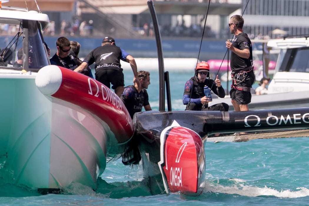 Team New Zealand helmsman Peter Burling gives the thumbs up after beating Oracle Team USA in race 8.