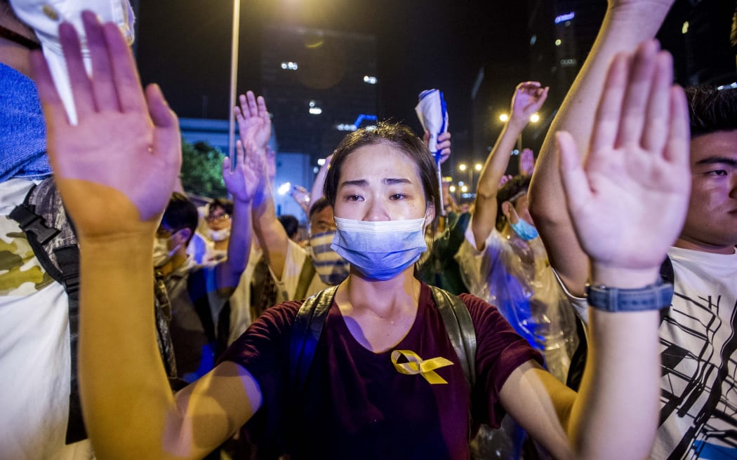 Pro-democracy demonstrators brought parts of central Hong Kong to a standstill.