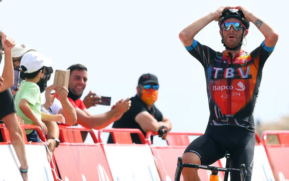 Team Bahrain's Italian rider Damiano Caruso celebrates as he wins the 9th stage of the 2021 La Vuelta cycling tour of Spain, a 188 km race from Puerto Lumbreras to Alto de Velefique, on August 22, 2021.