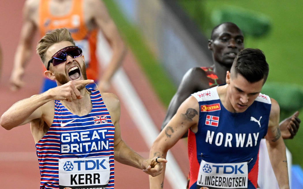 Britain's Josh Kerr celebrates next to Norway's Jakob Ingebrigtsen after winning the men's 1500m final during the 2023 World Athletics Championships
