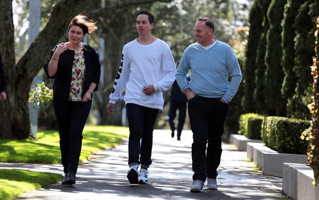 John key with his wife Bronagh and son Max walking to Parnell school to vote
