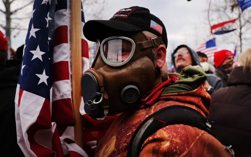 WASHINGTON, DC - JANUARY 06: Thousands of Donald Trump supporters storm the United States Capitol building following a "Stop the Steal" rally on January 06, 2021 in Washington, DC.