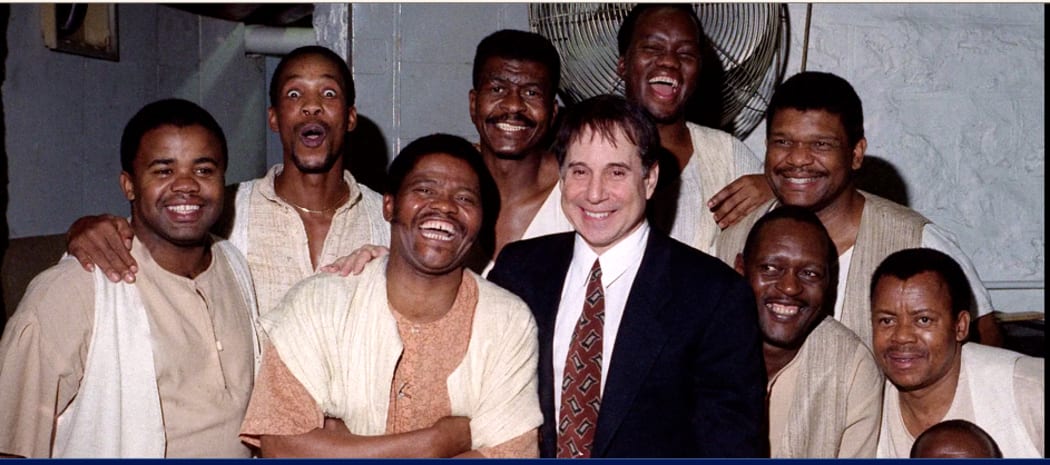 Joseph Shabalala, front left with members of Ladysmith Black Mambazo and Paul Simon
