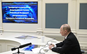 Russian President Vladimir Putin oversees the training of the strategic deterrence forces, troops responsible for responding to threats of nuclear war, via a video link in Moscow on 26 October 2022.