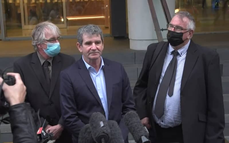 Alan Hall’s brothers Greg, Geoff and Robert speak outside the Supreme Court.