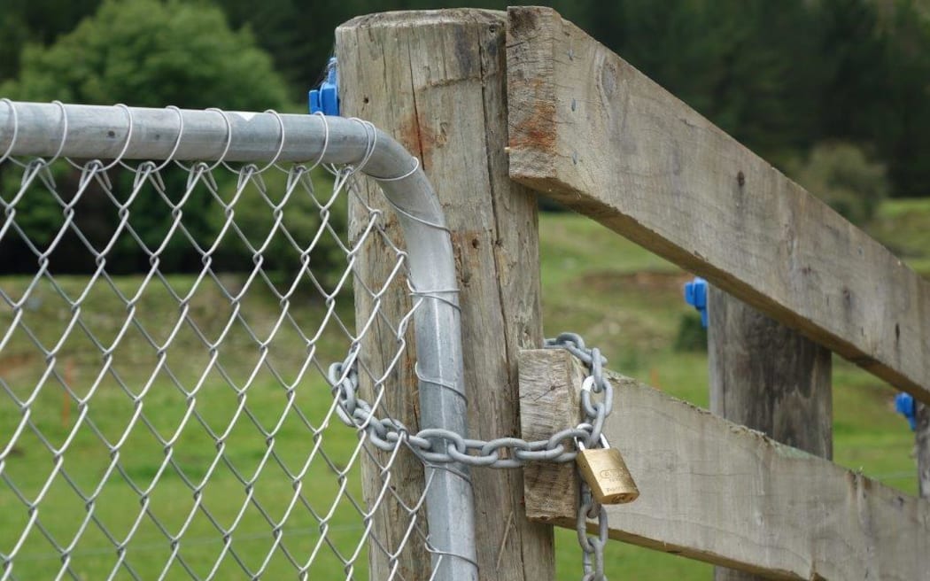 Farm gate chained and padlocked
