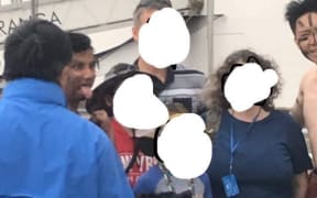 Non-Māori cruise ship staff wear fake moko, perform pōwhiri for tourists.