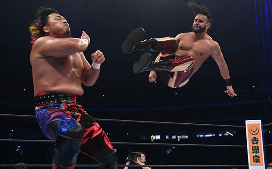 Tama Tonga in a title fight for the Never Openweight championship.