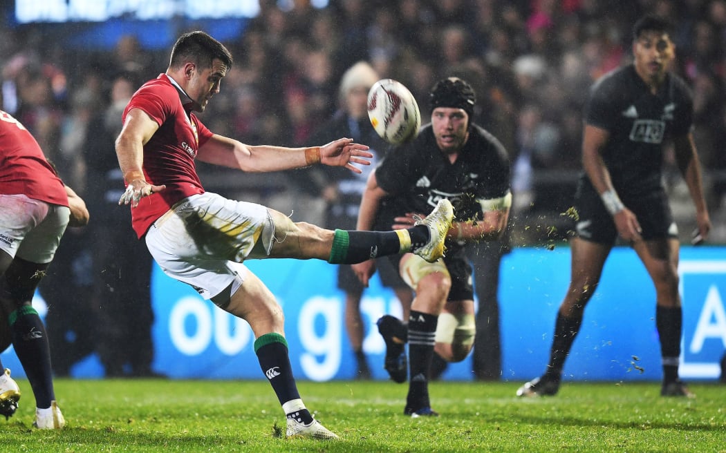 Conor Murray takes a kick.