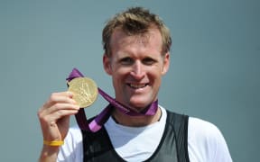 Mahé Drysdale showing off his medal after winning gold at the London Olympics in 2012.