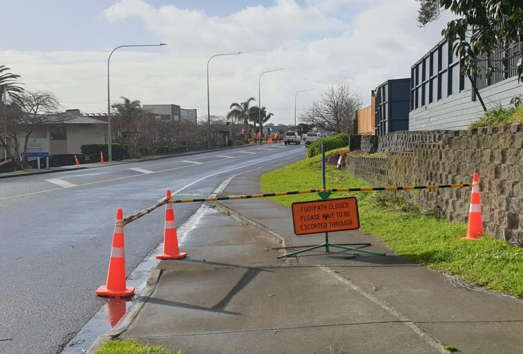 A cordon on Rosedale Rd on 3 August 2021 where workers are repairing high-voltage overhead lines damaged in severe wind gusts.