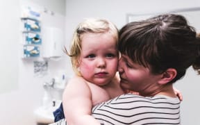 Elliot and her mum, Caroline Beech