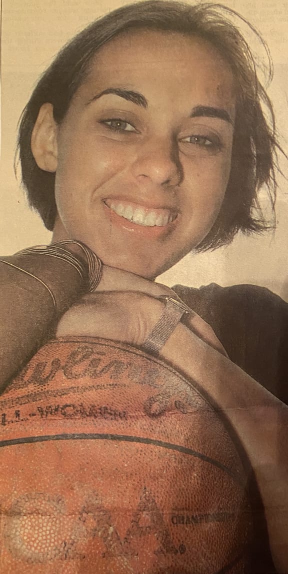Post-WNBA season in 1998 Megan is captured in an article as she heads to Germany.