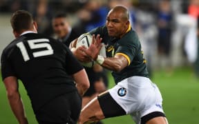 South Africa's Cornal Hendricks heads to the try line against the All Blacks in Wellington, 2014