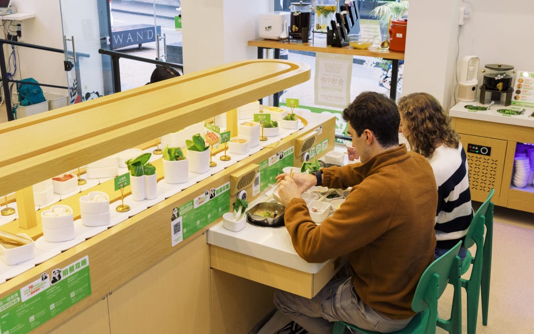 Chinese hot pot restaurant Pandaroll Running Pot.