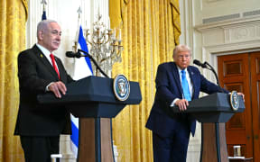 US President Donald Trump (R) and Israel's Prime Minister Benjamin Netanyahu take questions during a press conference in the East Room of the White House in Washington, DC, on February 4, 2025. (Photo by ANDREW CABALLERO-REYNOLDS / AFP)