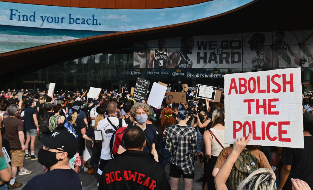 Protesters gather during a "Black Lives Matter" protest near Barclays Center on May 29, 2020 in the Brooklyn borough of New York City, in outrage after George Floyd, an unarmed black man, died while being arrested