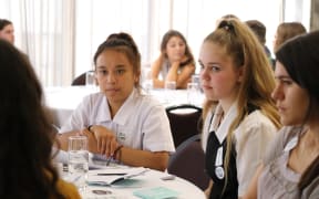 Xyryll Gayagoy, 17 and Zoe Williams-Verahey, 16 attend a workshop on how to make submissions on bills