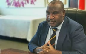 PNG Prime Minister James Marape speaks to his Japanese counterpart Yoshide Suga during a virtual online summit, 29 June 2021.