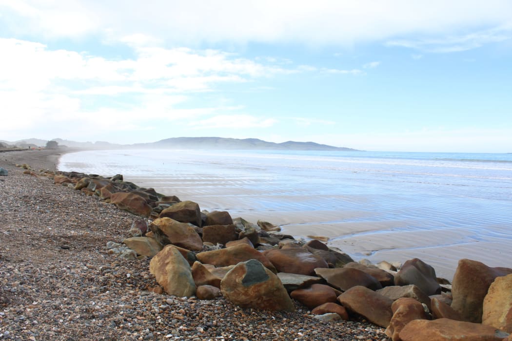 PHOTO: LAURA SMITH The last section of rock-wall in Colac Bay has slumped, meaning it is less effective at protecting against erosion.