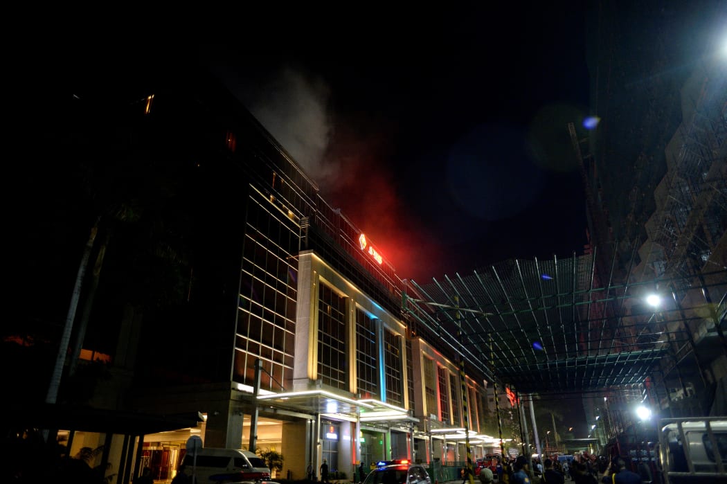 A gunman fired shots and set gaming tables alight at Resorts World Manila just after midnight local time.