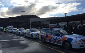 Police cars outside Queenstown airport after it was evacuated.