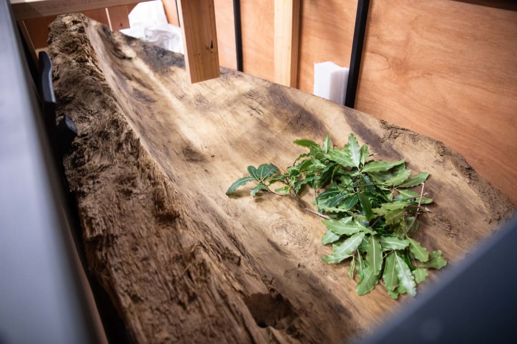 Hull of a centuries-old waka, unearthed in the banks of Te Awaikairangi, the Hutt River, is returned to its ancestral owners.