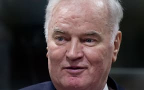 Former Bosnian Serb commander Ratko Mladic enters the International Criminal Tribunal.
