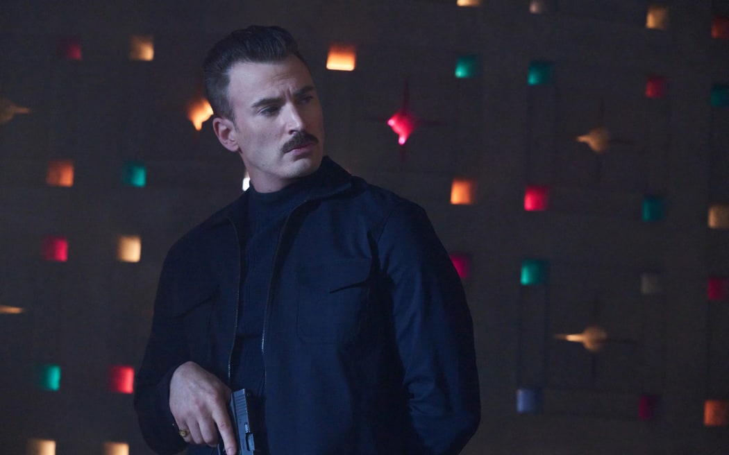 Chris Evans plays the sociopathic private security contractor Lloyd Hansen in the Netflix comedy-thriller The Gray Man.