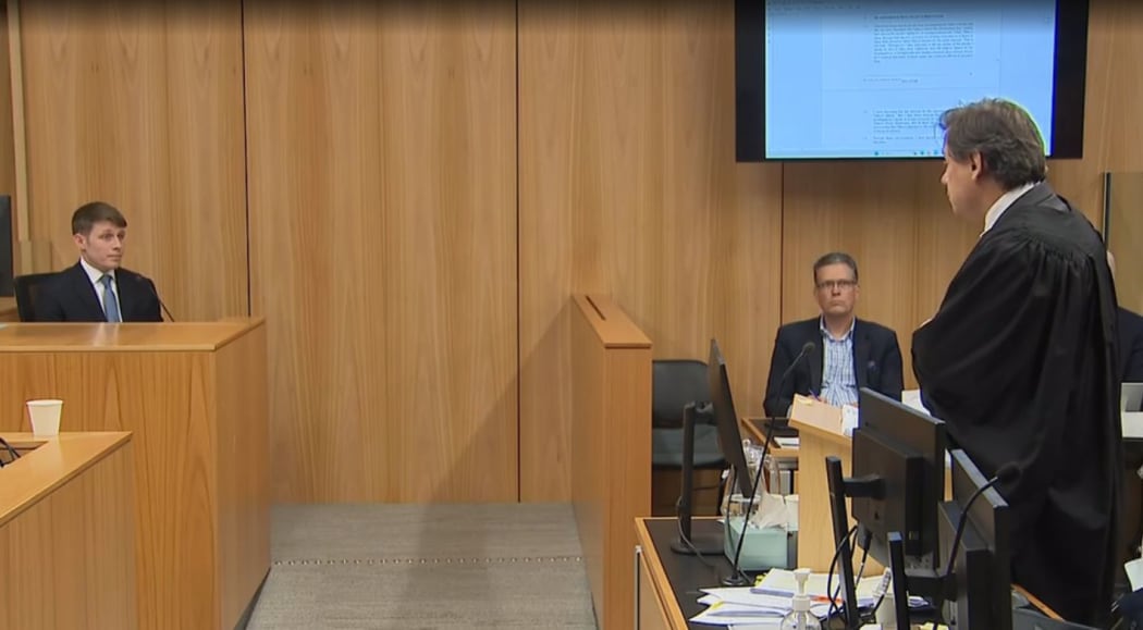 TVNZ reporter Thomas Mead (L) is questioned by Brian Dickey KC (R) while Tim Murphy of Newsroom looks on.