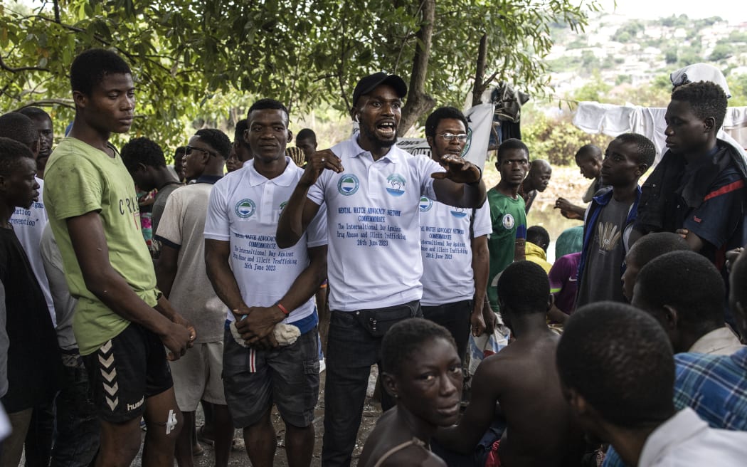 A anti-drug activist gives a talk at a site used as a Kush 'drug den' in Sierra Leone's capital, Freetown, on 26 June, 2023.