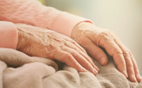 Elderly woman's hands, care for the elderly concept